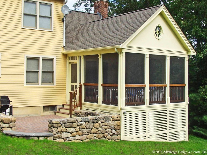 Screened in Porch on backyard of yellow home